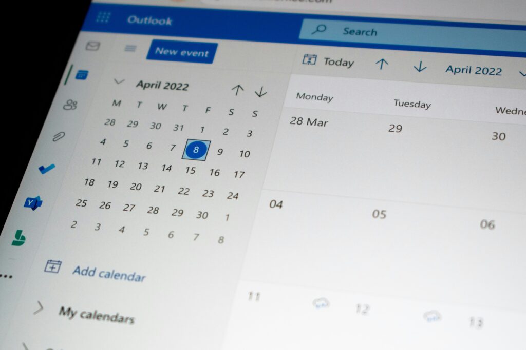 Microsoft 365 services interface showing the Outlook calendar view with scheduled dates, navigation panel, and productivity tools used for business email and scheduling.